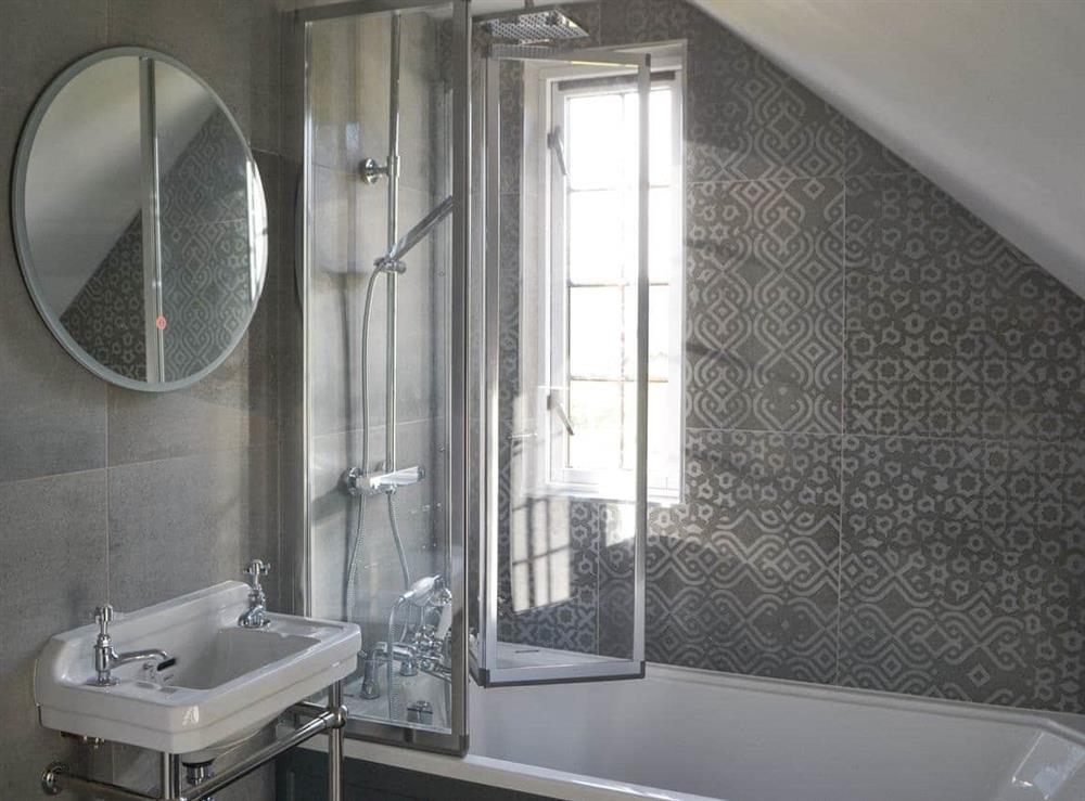Bathroom with shower over bath at Honey Pot Cottage in near Rothbury, Lancashire