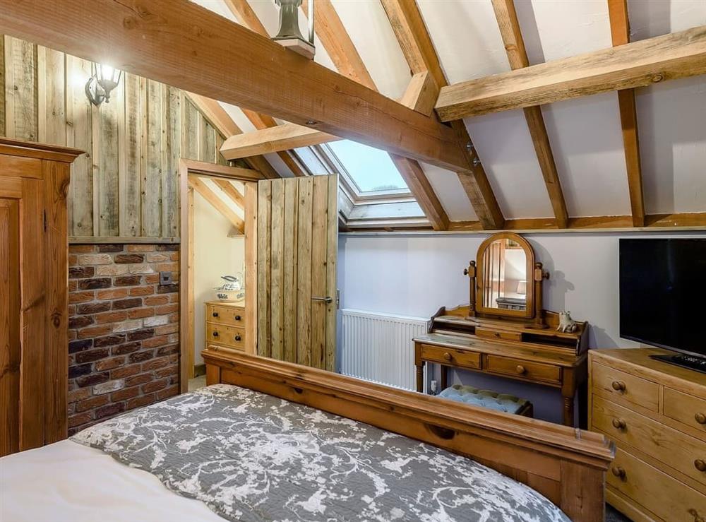 Relaxing double bedroom with beams (photo 3) at Honey Potts in Foulden, near Swaffham, Norfolk