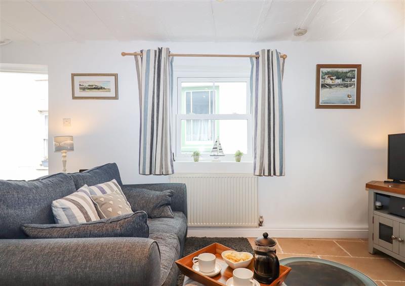 Relax in the living area at Honeymoon Cottage, Appledore