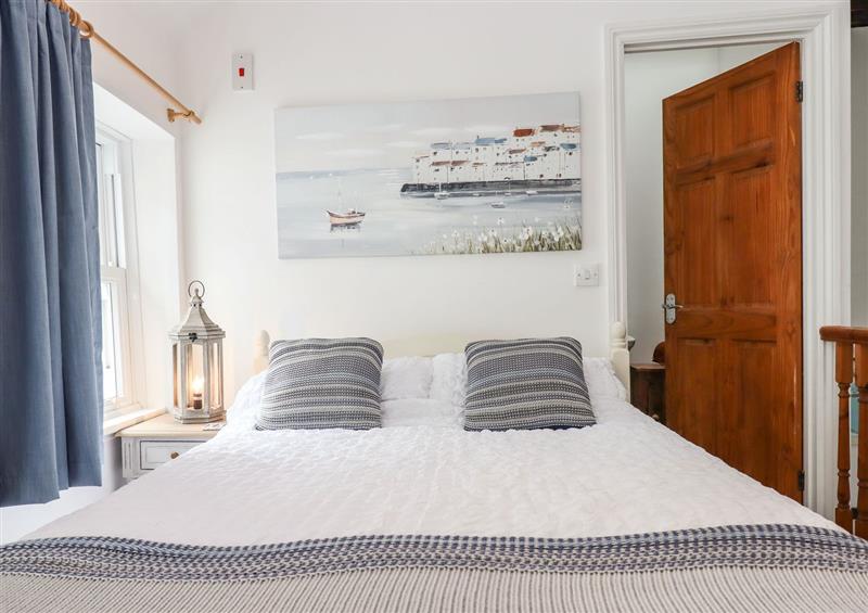 This is the bedroom at Honeymoon Cottage, Appledore