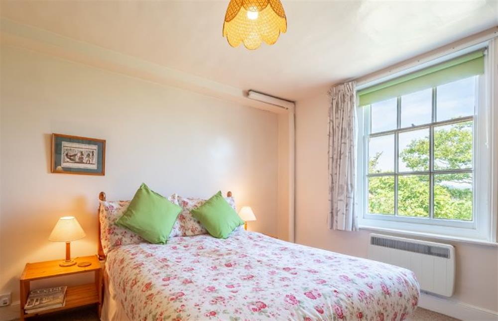 Bedroom with double bed at Honeypot Cottage, Falkenham