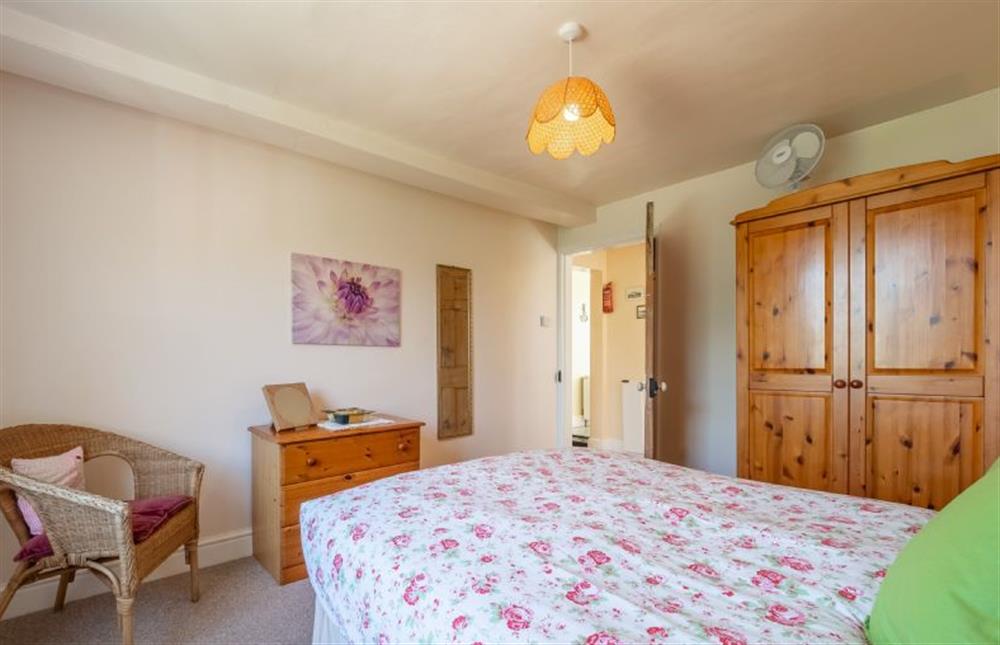 Main bedroom with double bed at Honeypot Cottage, Falkenham