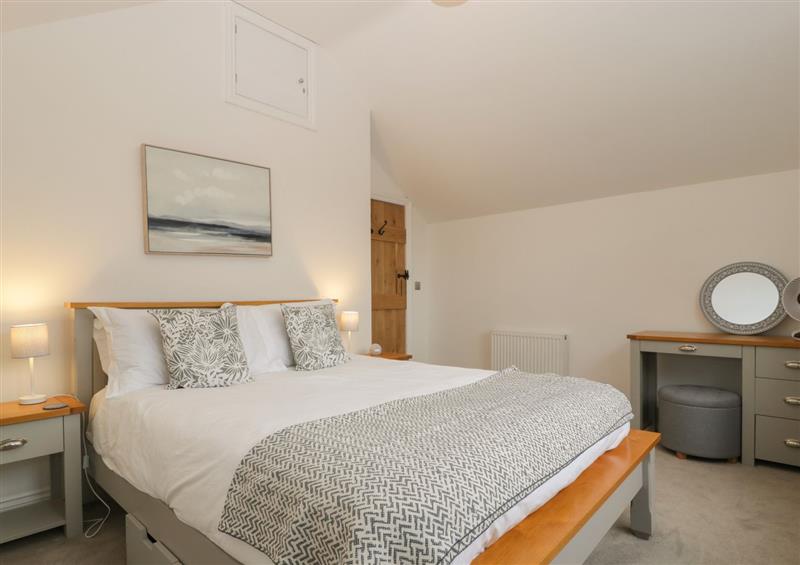 One of the 3 bedrooms at Honeypot Cottage, Shipton Gorge near Burton Bradstock