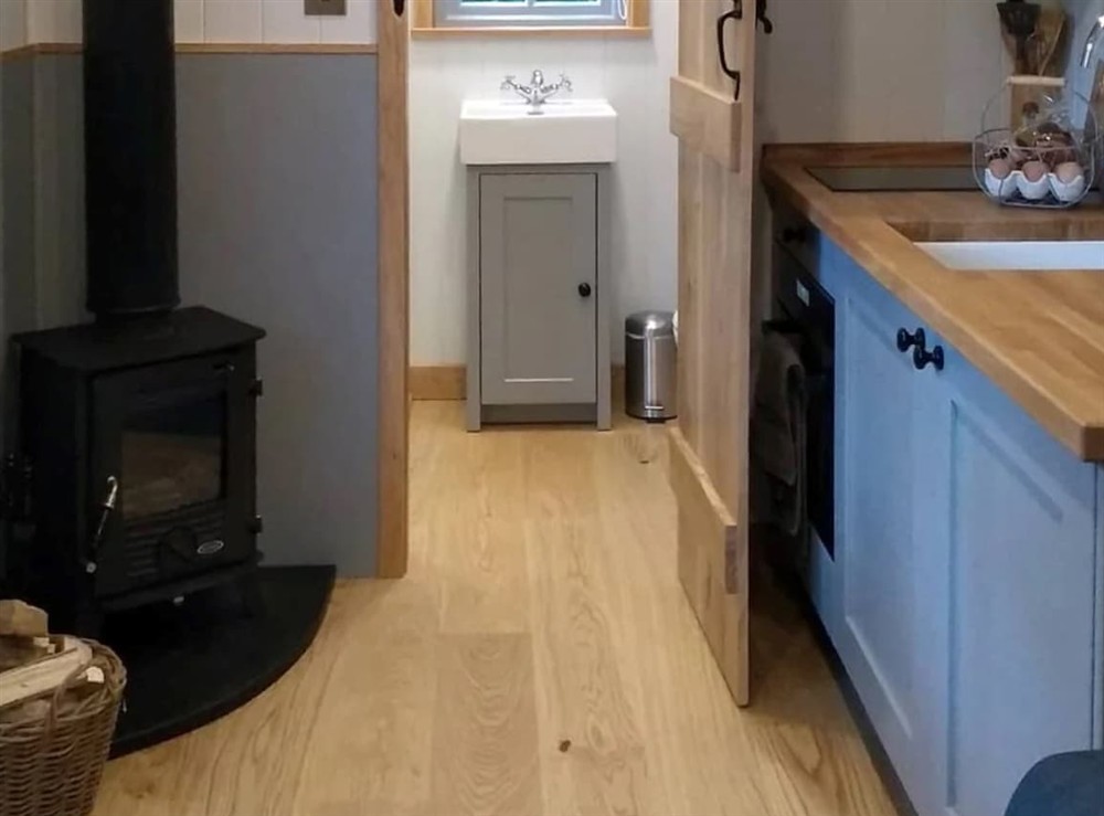 Open plan living space at Honeysuckle Barn in Ashurst, West Sussex