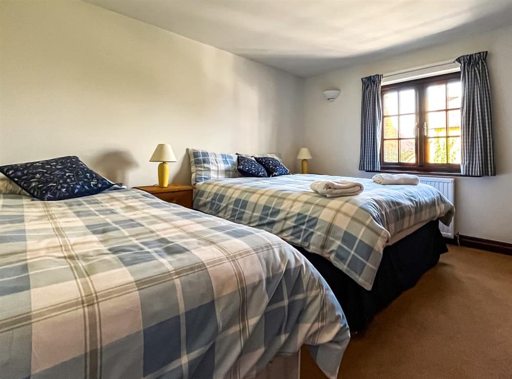 Twin bedroom at Honeysuckle Cottage in Mickleton, Gloucestershire