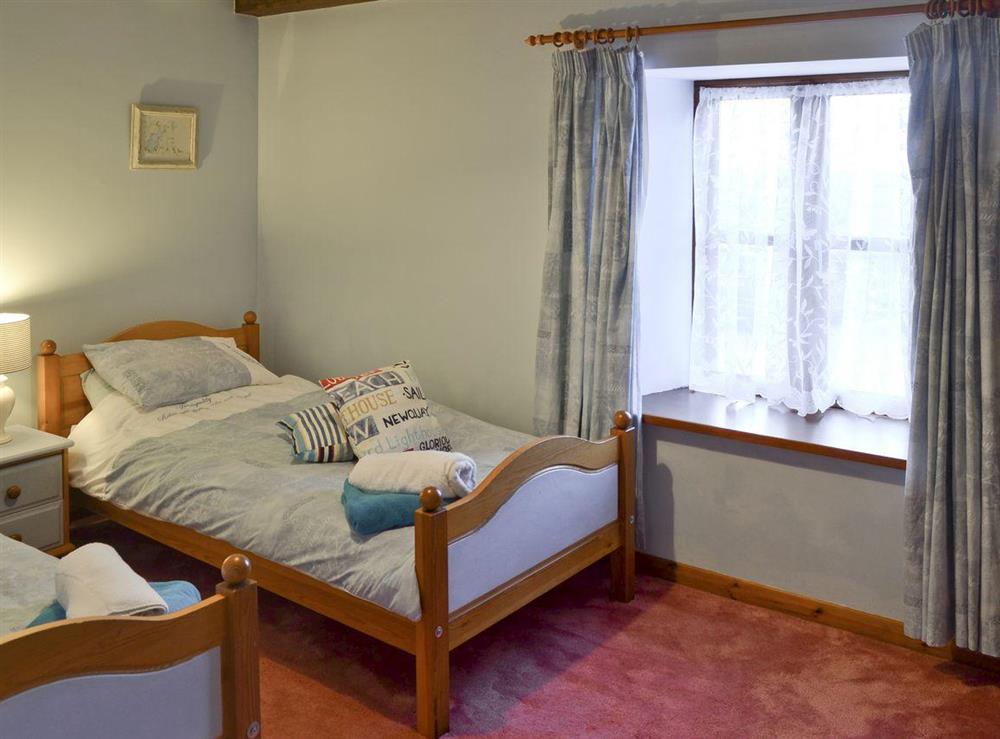 Convenient twin bedroom at Honeysuckle Cottage in Nr. Newquay, Cornwall