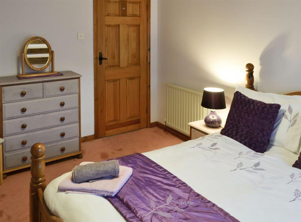 Roomy double bedroom at Honeysuckle Cottage in Nr. Newquay, Cornwall