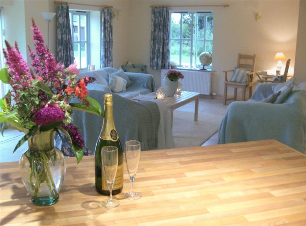 Living room/dining room at Honeysuckle Cottage in Oasby, near Grantham, Lincolnshire
