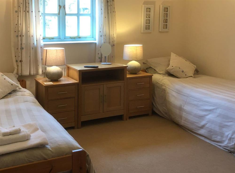 Twin bedroom at Honeysuckle Cottage in Oasby, near Grantham, Lincolnshire