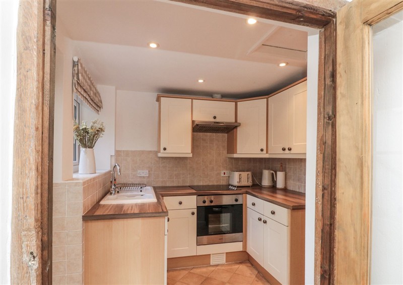 This is the kitchen (photo 2) at Honeysuckle Cottage, Oswaldkirk near Helmsley
