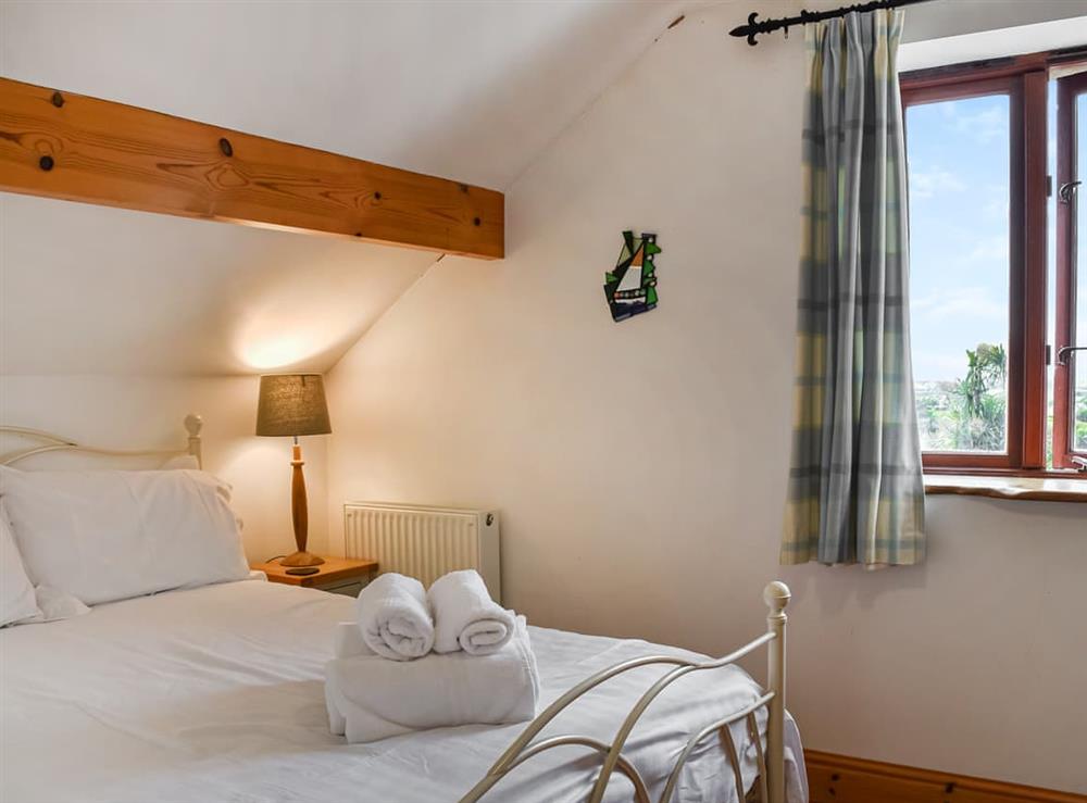 Double bedroom at Honeysuckle Cottage in Pennard, West Glamorgan