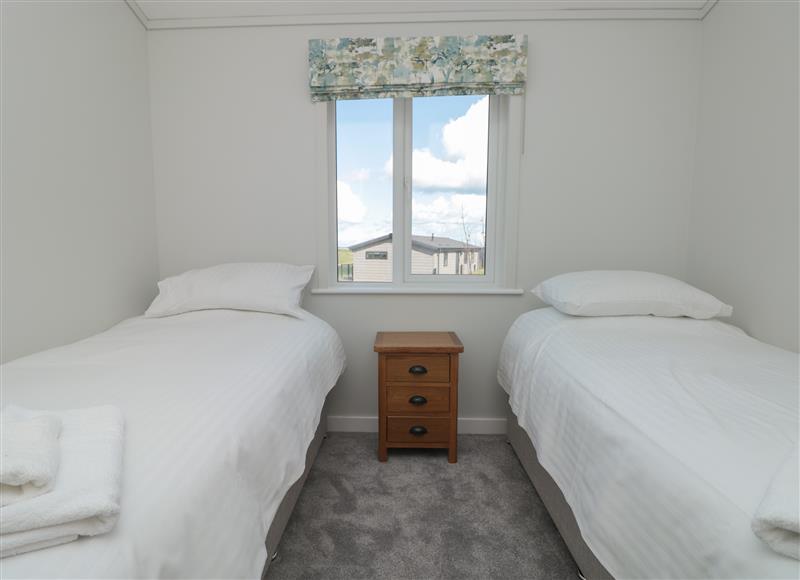 One of the 2 bedrooms at Honeysuckle Lodge, Norton near Dartmouth