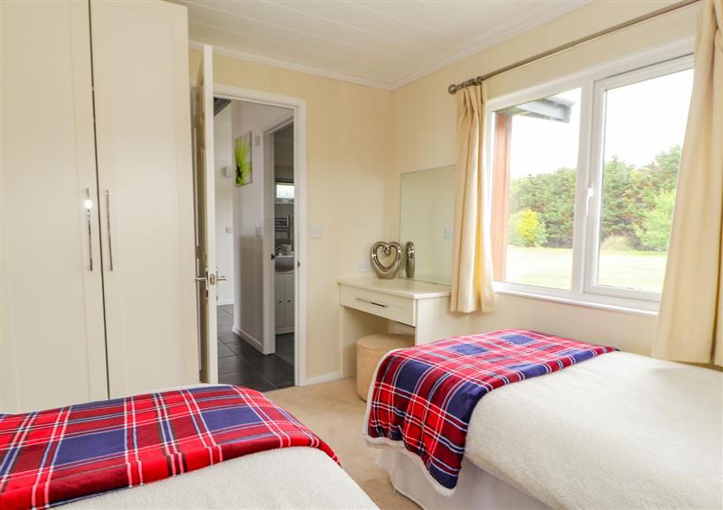This is a bedroom (photo 2) at Honeysuckle Lodge, Towyn