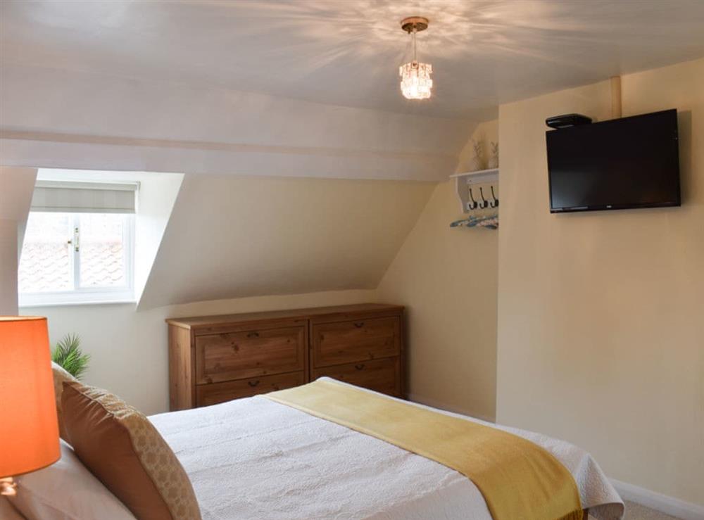 Double bedroom with TV at Honeyz Hideaway in Whitby, Yorkshire, North Yorkshire