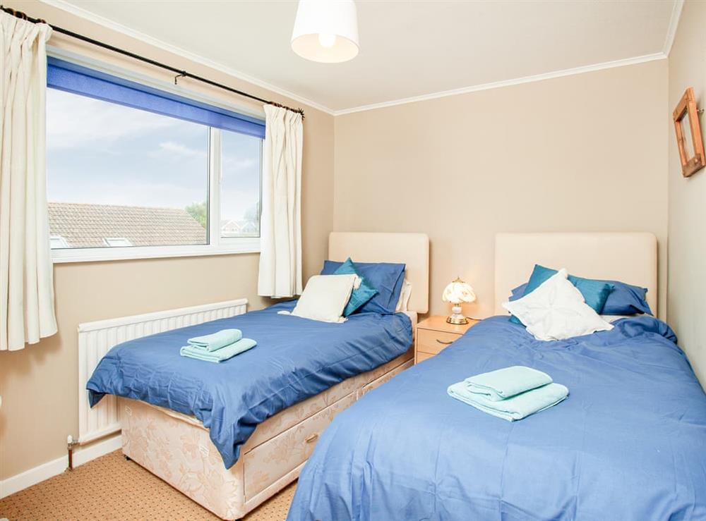 Twin bedroom at Hookhills Holiday Home in Paignton, Devon
