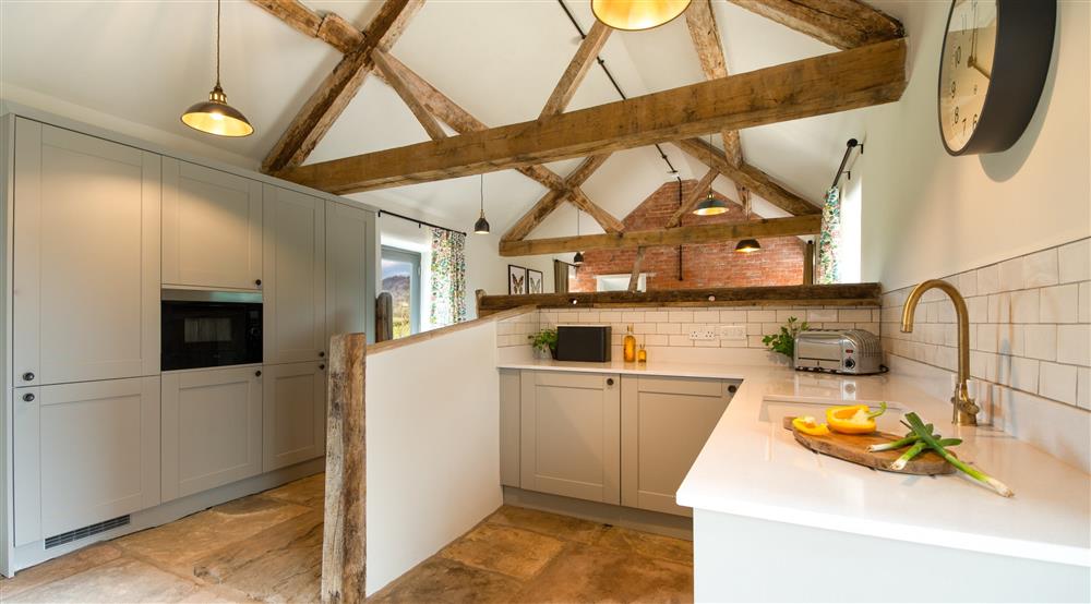 The kitchen and dining room (photo 3) at Hop Kiln Cart Barn in Bromyard, Herefordshire