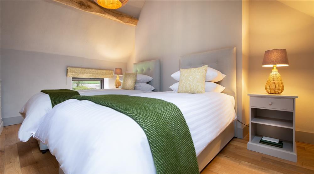 The twin bedroom at Hop Kiln Cart Barn in Bromyard, Herefordshire