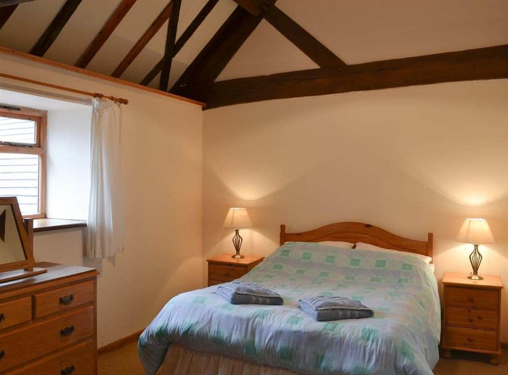 Double bedroom with additional bed at Hopbine in Bromyard, near Malvern Hills, Herefordshire