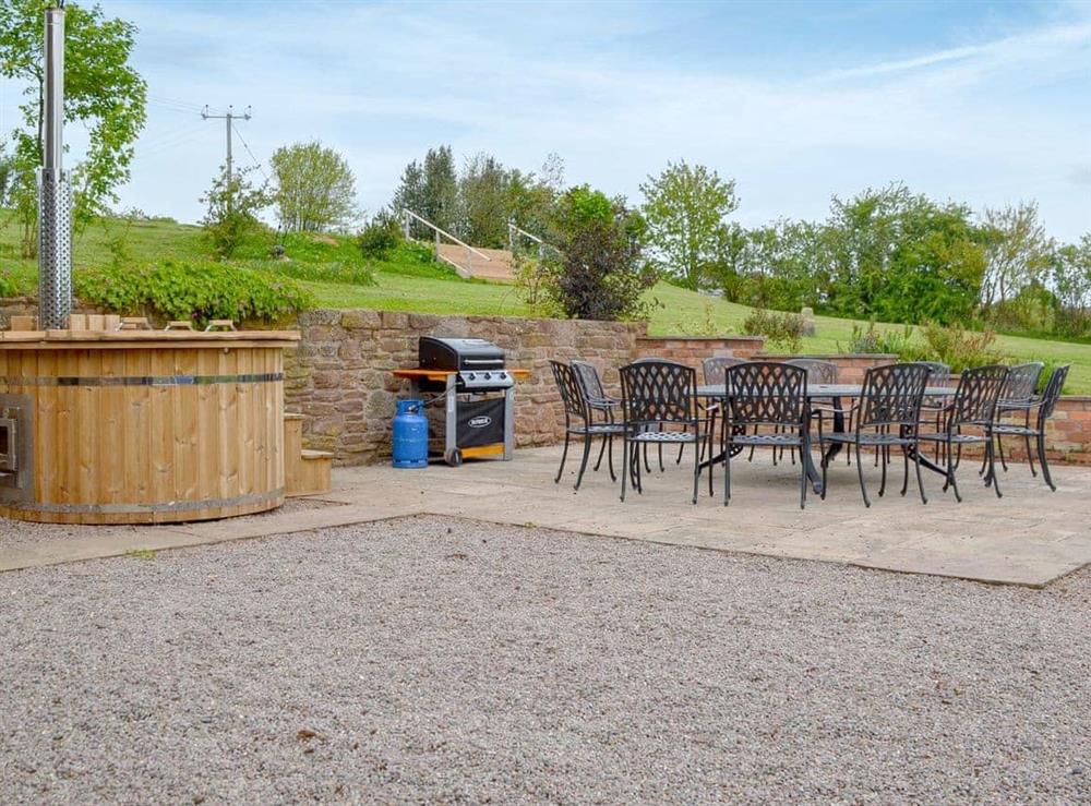 Hot Tub & outside dining area with BBQ at Hopbine in Bromyard, near Malvern Hills, Herefordshire
