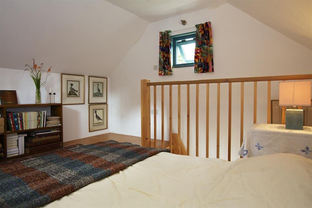Bedroom with double futon bed (Pump House) at Hope Cottage (Loddiswell) in Loddiswell, Nr Kingsbridge
