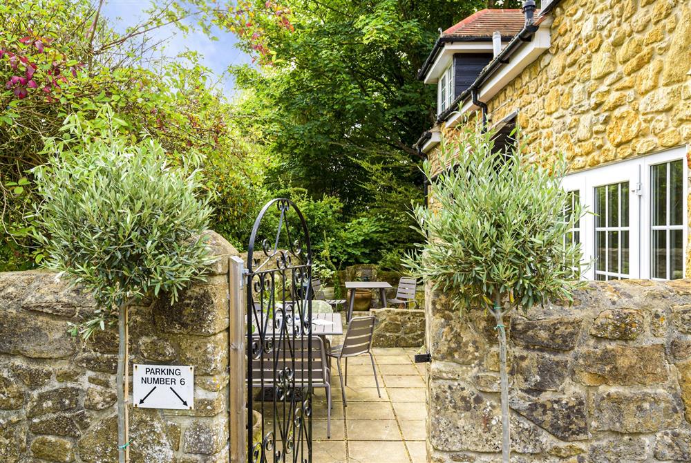 The front aspect with courtyard garden at Hope Cottage, Bridport