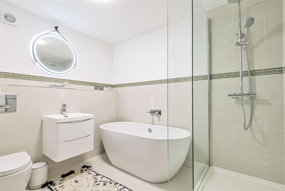 The stylish ground floor bathroom with separate shower at Hope Cottage, Bridport