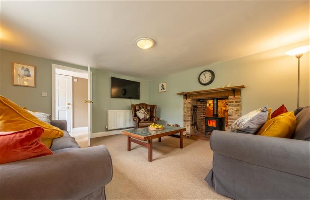 A very restful sitting room with wood burning stove