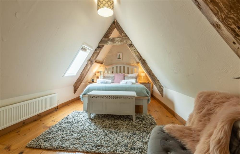 First floor: Characterful vaulted bedroom at Hope Cottage, Holme-next-the-Sea near Hunstanton