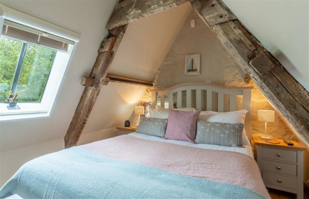 First floor: The bedroom has distant sea views at Hope Cottage, Holme-next-the-Sea near Hunstanton