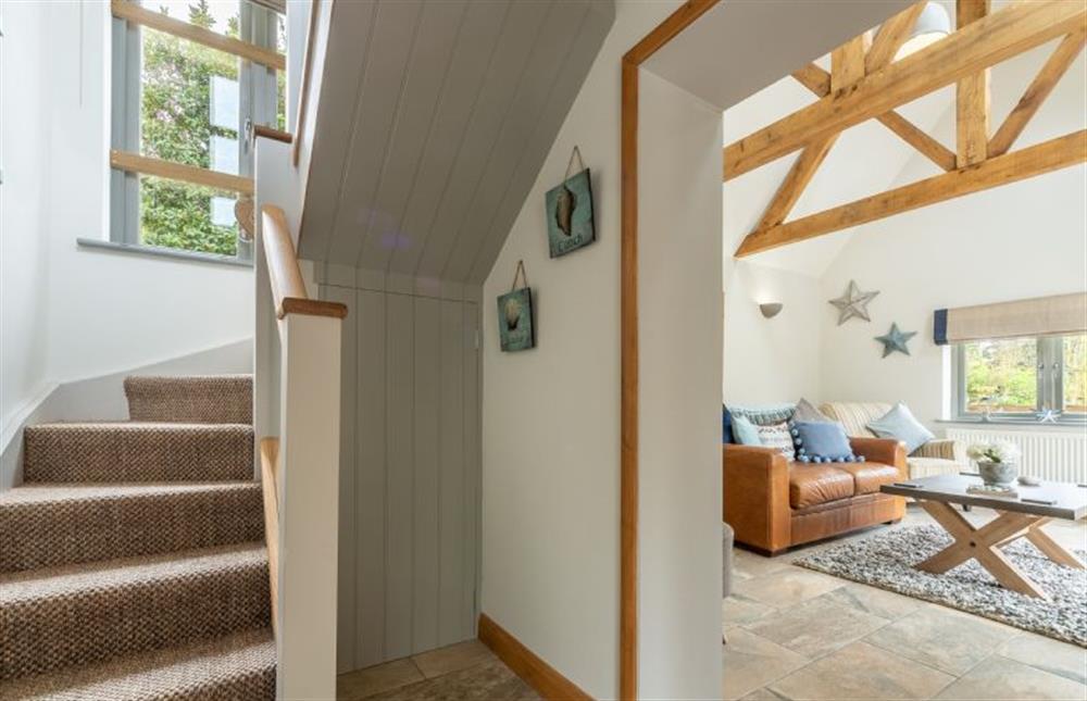 Ground floor: Garden room and stairs to first floor at Hope Cottage, Holme-next-the-Sea near Hunstanton