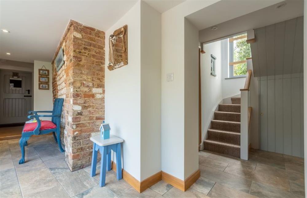 Ground floor: The hallway and stairs are fresh and stylish at Hope Cottage, Holme-next-the-Sea near Hunstanton