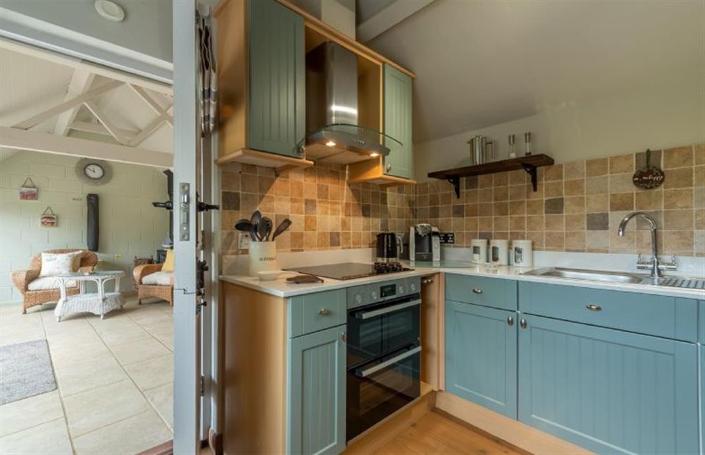 Ground floor: The Kitchen leads into the Sun room at Hope Cottage, Holme-next-the-Sea near Hunstanton