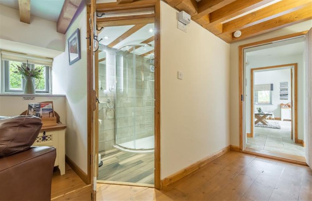 Ground floor: The modern shower room is adjacent to the Sitting room  at Hope Cottage, Holme-next-the-Sea near Hunstanton