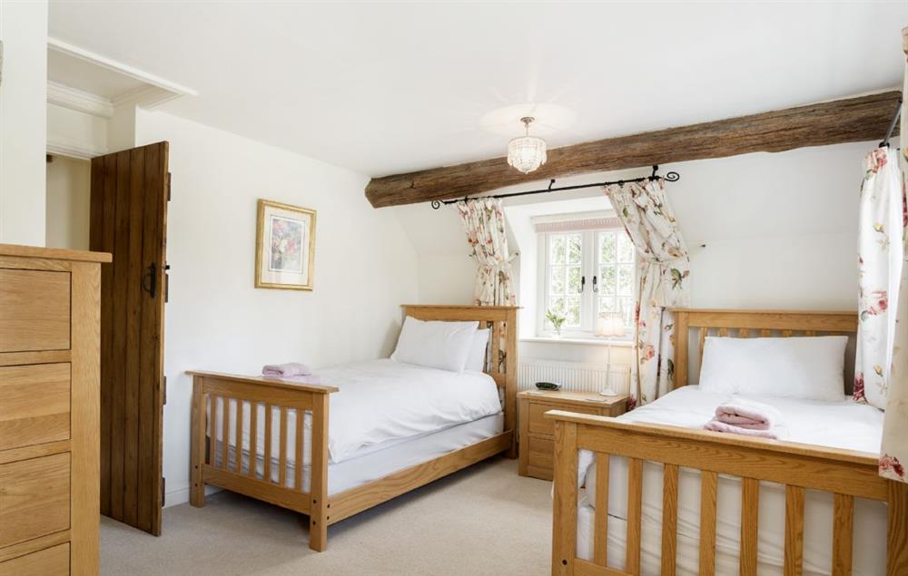 Second bedroom with two 3’ single beds at Hope Cottage, Quenington