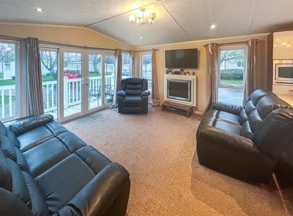 Living area at Hopton Holiday Relaxing Retreat in Hopton, Norfolk