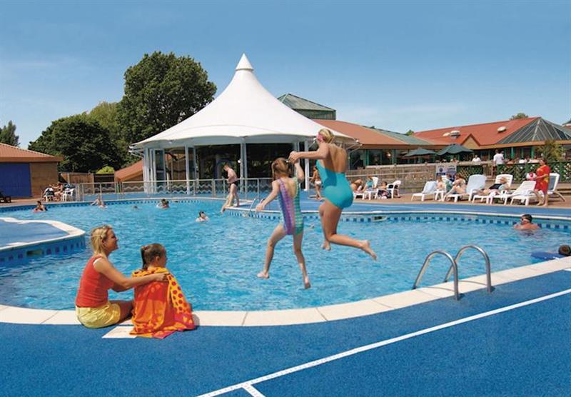 Outdoor heated pool at Hopton Holiday Village in Hopton–on–Sea, Norfolk