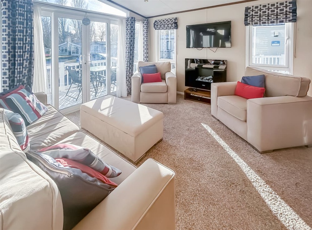 Open plan living space at Hopton Holiday Village Retreat in Hopton-on-Sea, near Great Yarmouth, Norfolk