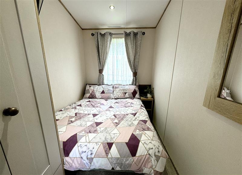 A bedroom in Hopton Lodge Retreat at Hopton Lodge Retreat, Hopton-On-Sea