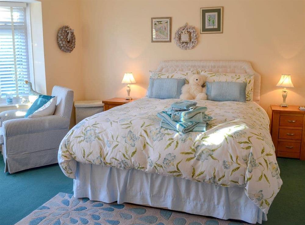 Spacious bedroom with kingsize bed at Horcum View in Lockton, near Pickering, North Yorkshire