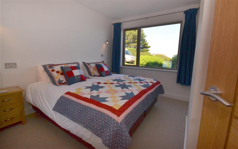 The second double bedroom with great views of the coastline. at Horizons in East Prawle