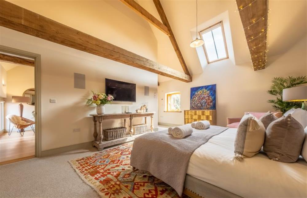 Bedroom one leading to the en-suite at Horse Yard Barn, Warham