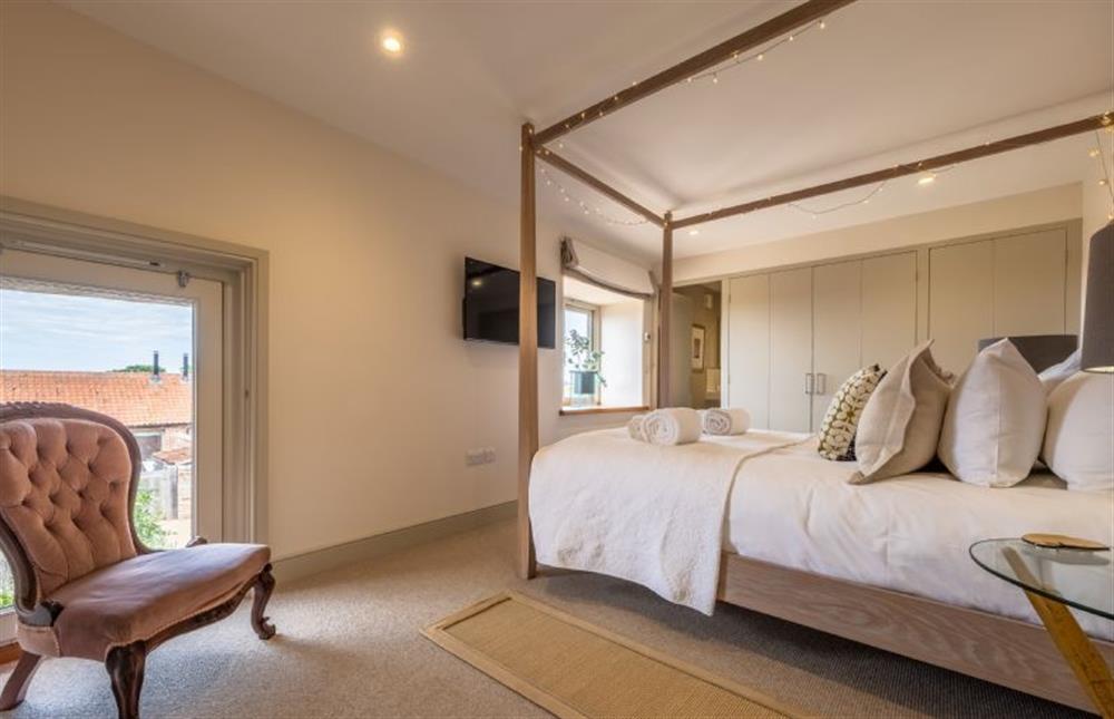 Bedroom two leading to the en-suite at Horse Yard Barn, Warham