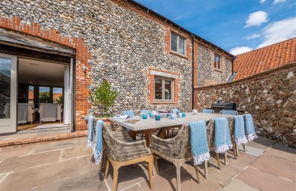 Large dining table for al fresco dining at Horse Yard Barn, Warham