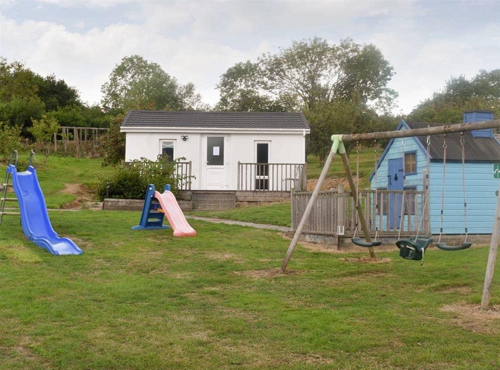 Children’s play area and Games room at Horselake Farm Cottages: Discovery in Cheriton Bishop, Devon
