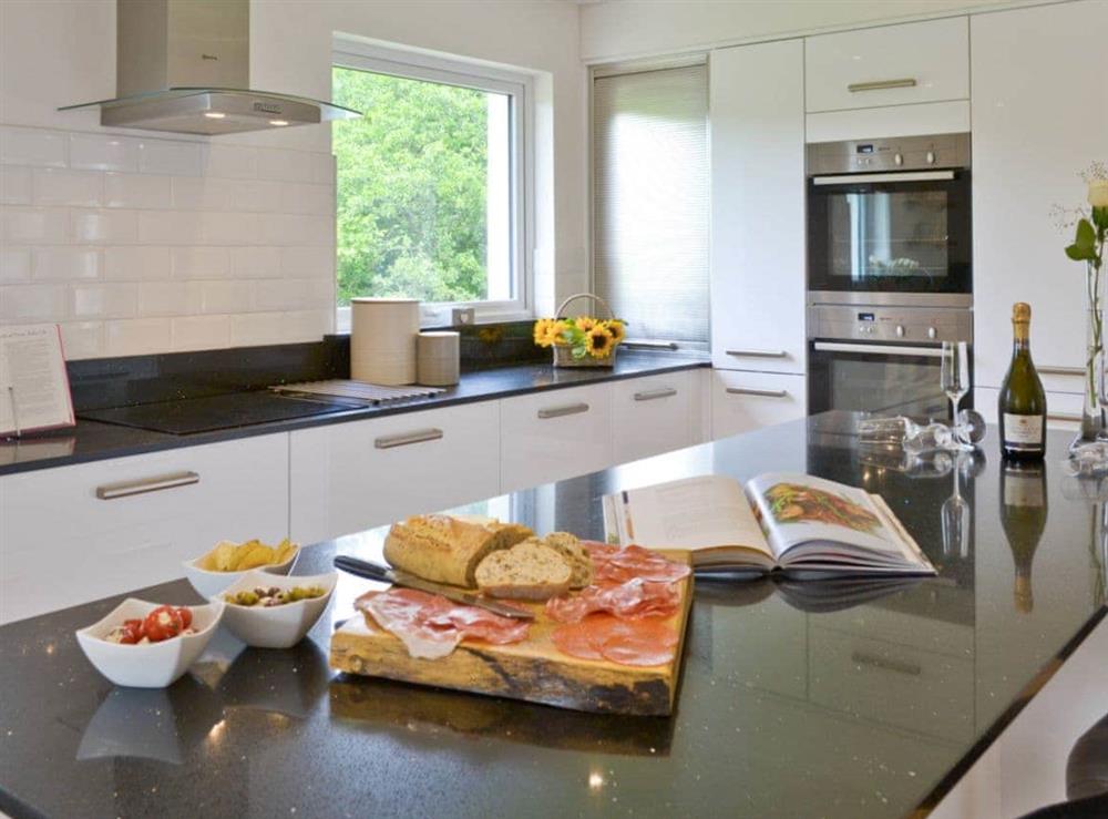 Well-equipped kitchen with ‘island’ breakfast bar at Florina, 