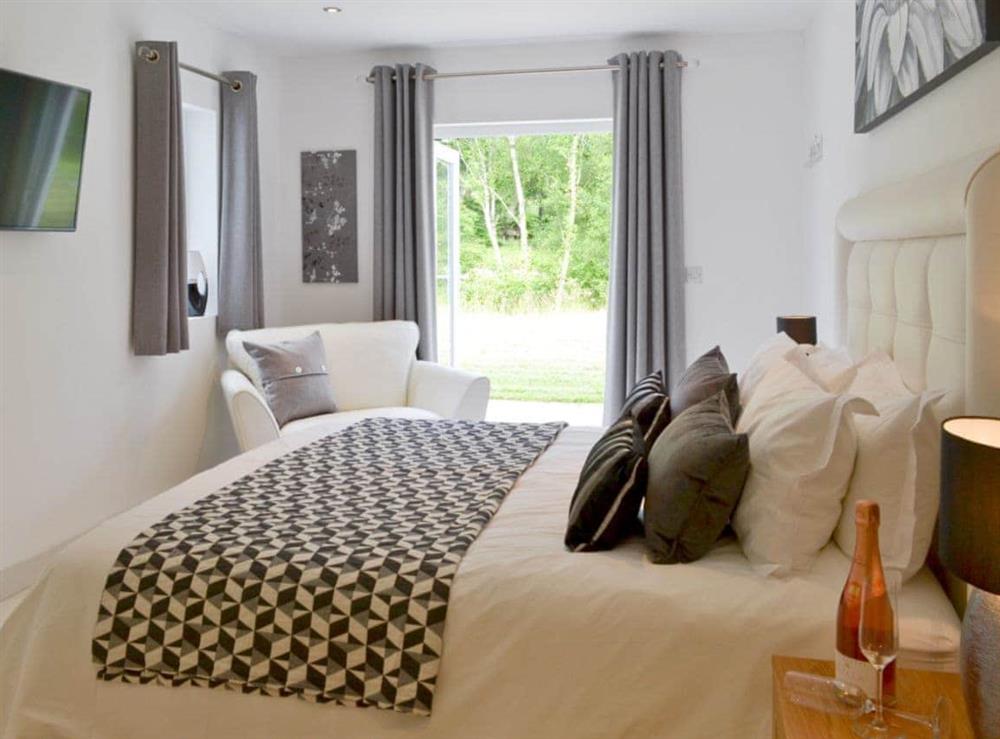 Light and airy master bedroom at Sundance, 