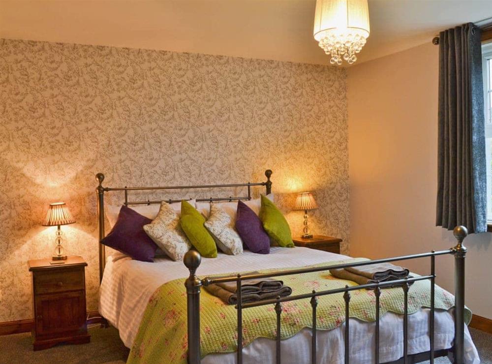 Tastefully furnished double bedroom with 5ft bed at Horsepark Cottage in Gatehouse of Fleet, Kirkcudbrightshire