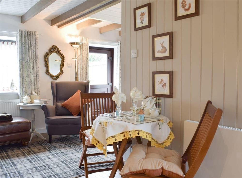 Convenient dining area at Horseshoe Cottage in Freuchie, near Cupar, Fife