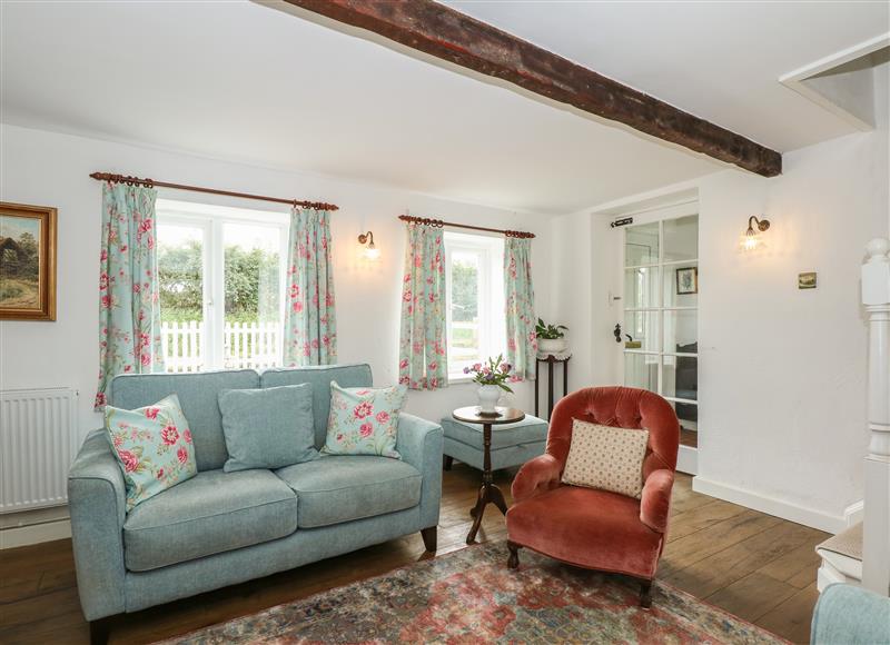 Relax in the living area at Horseshoe Cottage, Pentney