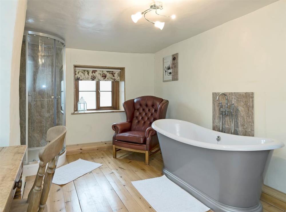 Sumptuous bathroom with  roll-top bath at Horseshoes House, 